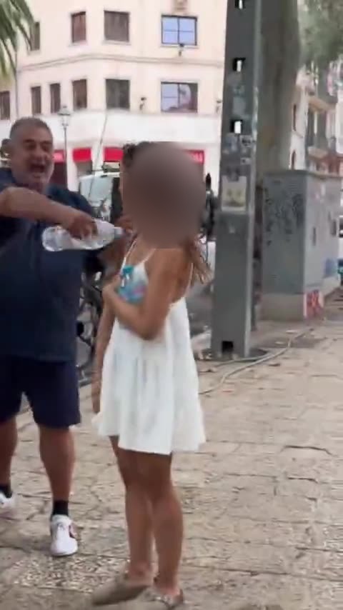 Driver throwing water — woman's face blurred
